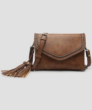 photo of leather handbag with tassle